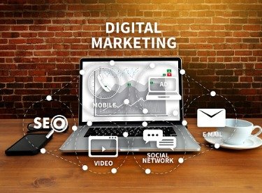 Concept of Digital Marketing in Tampa FL with a laptop surrounded by images and online marketing terms
